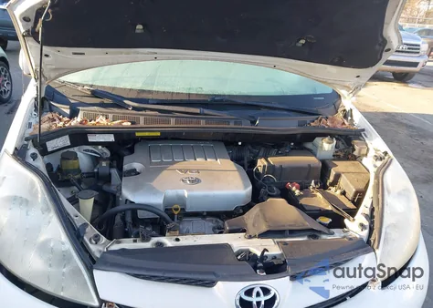 2009 Toyota Sienna Xle z USA, uszkodzony, nr VIN 5TDZK22C09S255844